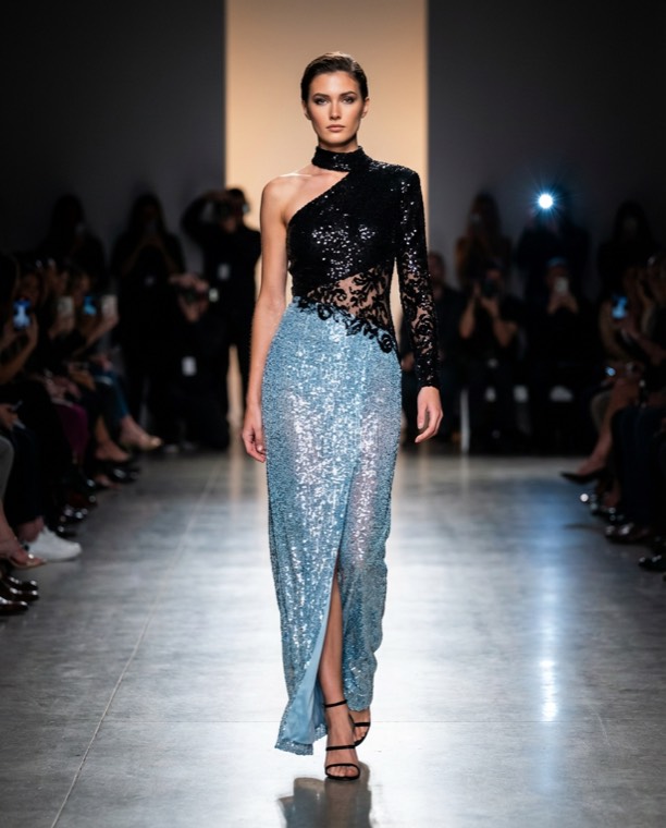 Runway visualization of the one-shoulder Caliente dress being worn